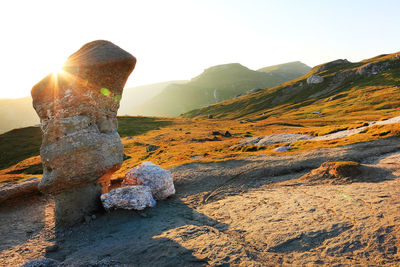 Rock formations on mountains during sunny day