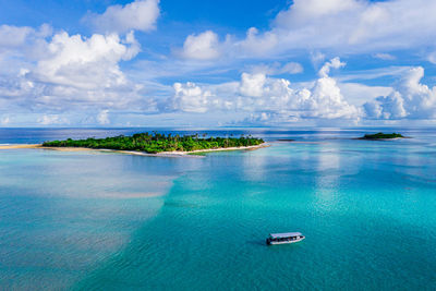 Scenic view of island in the middle of the sea against sky