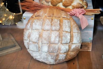 Crunchy and delicious loaf o bread in bakery window.