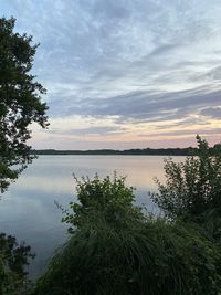 Scenic view of lake against sky during sunset