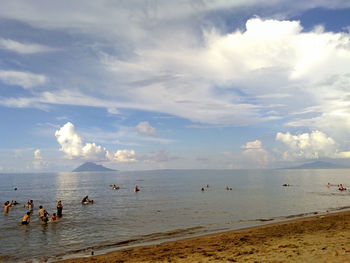 Scenic view of sea against cloudy sky