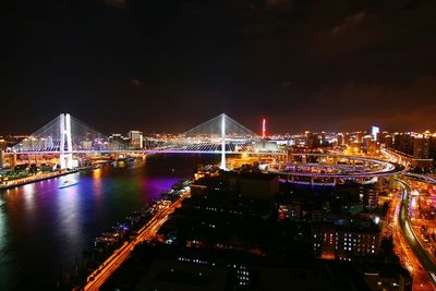 High angle view of illuminated suspension bridge at night