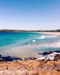 View of beach against blue sky