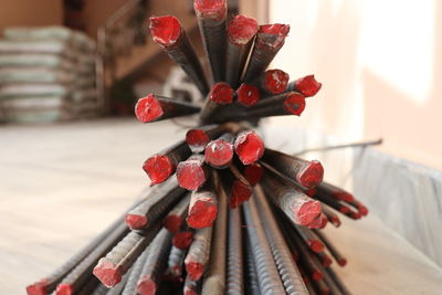 Close-up of red flowers on table