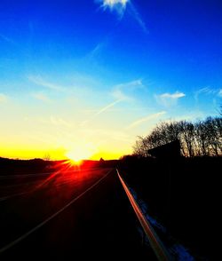 Road against sky during sunset