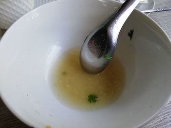 High angle view of egg in plate on table