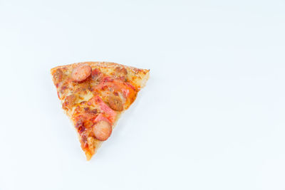 Close-up of cake against white background