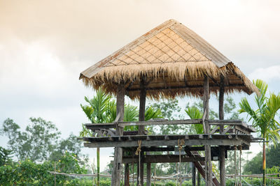 Built structure on roof of building against sky