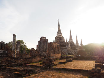 Old temple building against sky