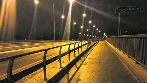 View of railway bridge at night