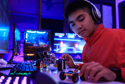 Portrait of man working on table