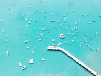 High angle view of boats sailing in sea