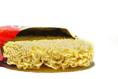 Close-up of cake against white background