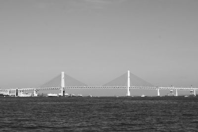 View of suspension bridge over sea