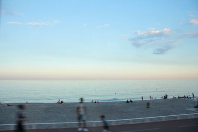 Scenic view of calm sea at sunset