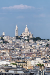 Sacre coeur viewed from top of arc de triomphe. famous landmark view with montmartre neighborhood