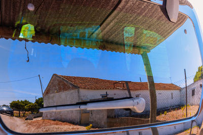 Low angle view of building against blue sky