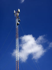 Gsm antenna of mobile communication on a blue sky background