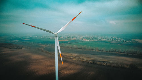 Aerial view of wind turbines on land