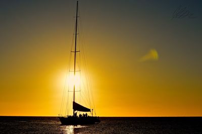 Scenic view of sea at sunset
