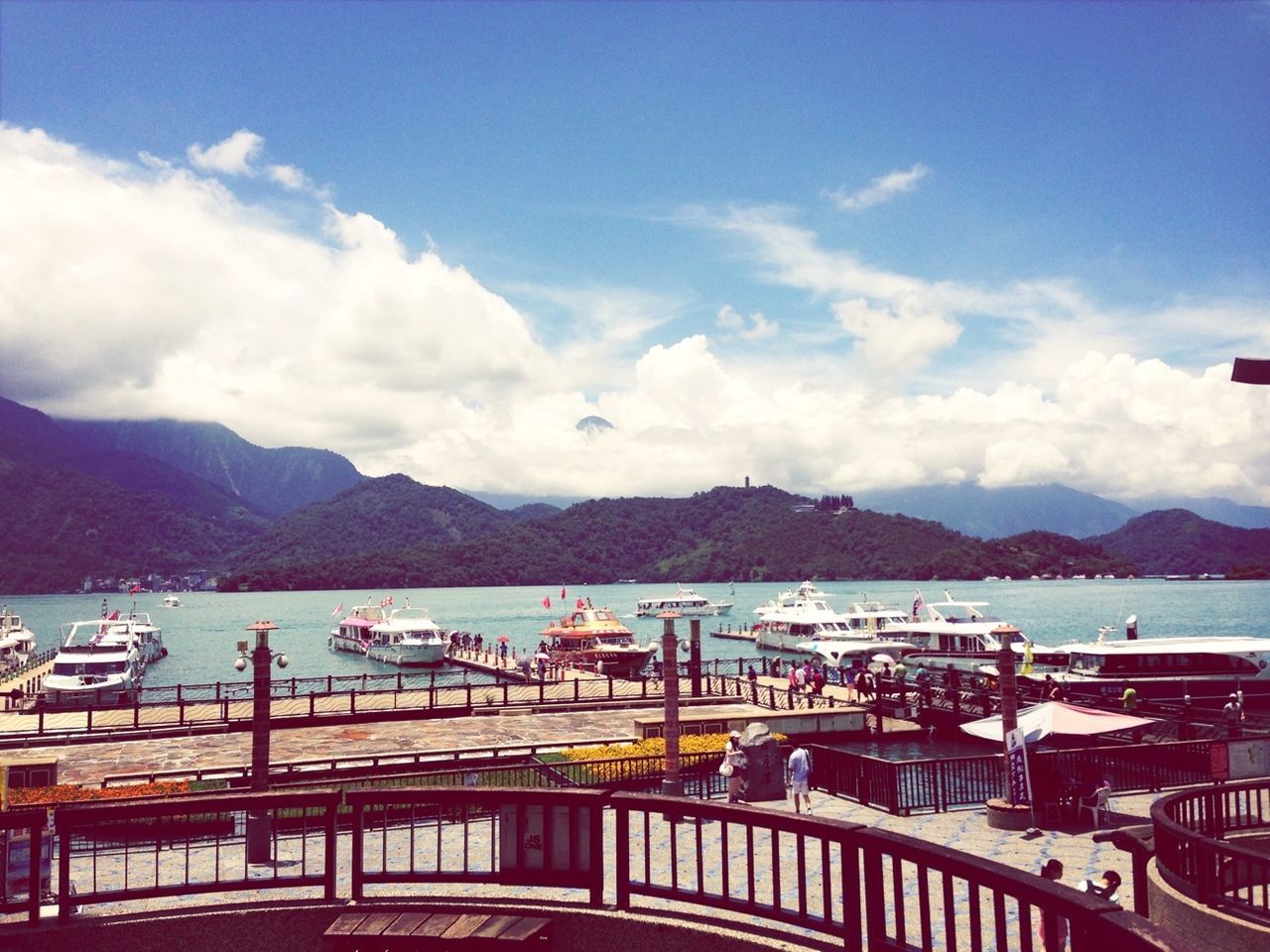 mountain, sky, mountain range, water, cloud - sky, transportation, nautical vessel, built structure, architecture, railing, cloud, boat, moored, mode of transport, river, lake, sea, nature, scenics, tranquility