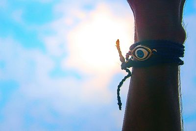 Low angle view of person against the sky