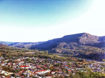 View of cityscape against clear sky