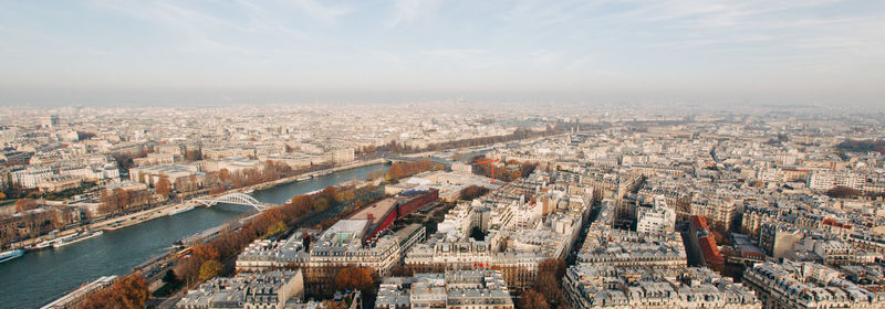 High angle view of city buildings against sky