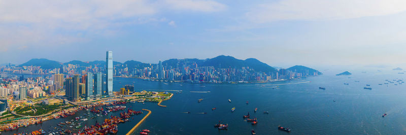 High angle view of boats in sea against sky