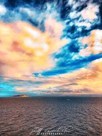 Scenic view of sea against sky at sunset