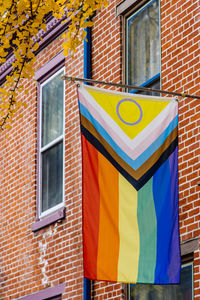 Multi colored windows on wall of building