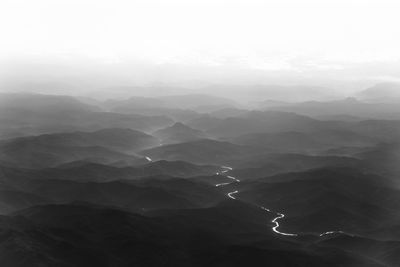 Aerial view of mountains against sky