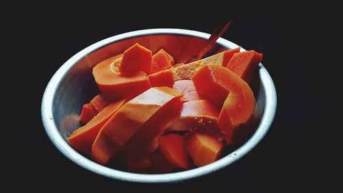 High angle view of chopped fruits in bowl