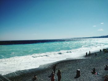 Scenic view of sea against clear blue sky