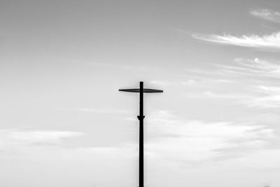 Low angle view of street light against sky