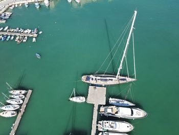 High angle view of sailboat sailing in sea