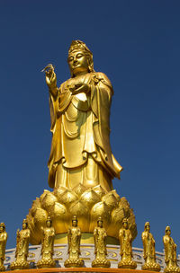 Kuan yin image of buddha chinese art on blue sky