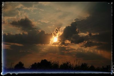Scenic view of dramatic sky during sunset