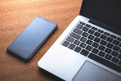 High angle view of laptop keyboard on table