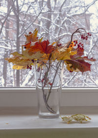 Close-up of flower vase on table