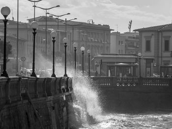 Panoramic view of sea against sky in city