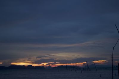 Scenic view of sea against sky at dusk