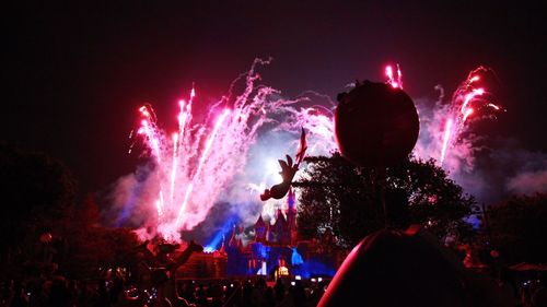 Firework display at night