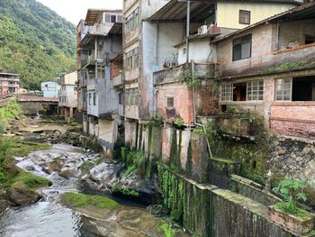 Residential buildings by rocks