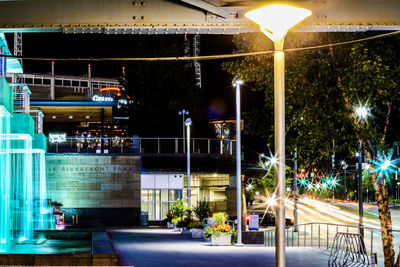 Illuminated street at night