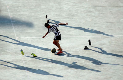 Silhouette of woman in stadium