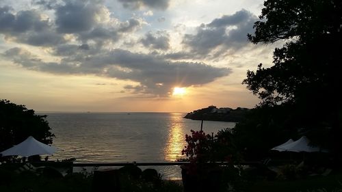 Scenic view of sea at sunset