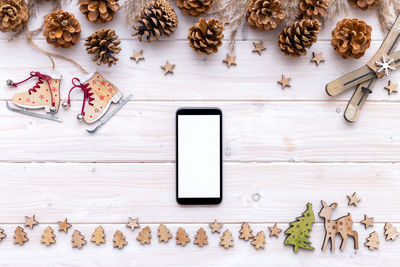 High angle view of mobile phone on table