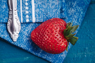 High angle view of strawberries on table