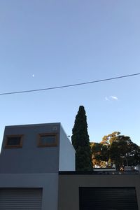 Low angle view of buildings against clear sky